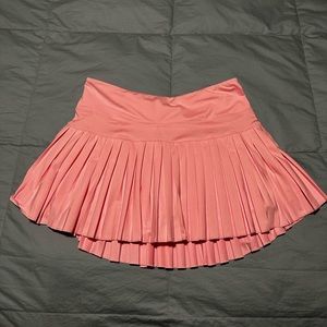 gold hinge pleated tennis skirt